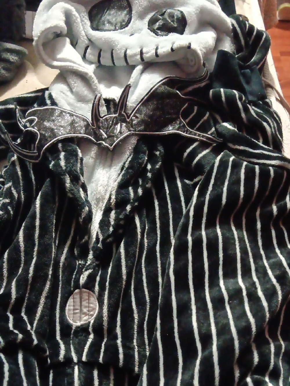 Striped Skull Hooded Plush Onsie with Bat Accent